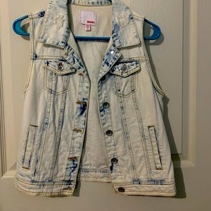 Medium denim vest jacket.